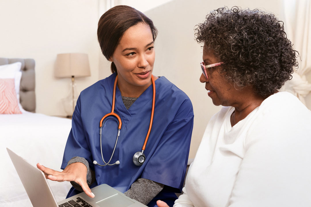 Doctor showing patient how to play minecraft